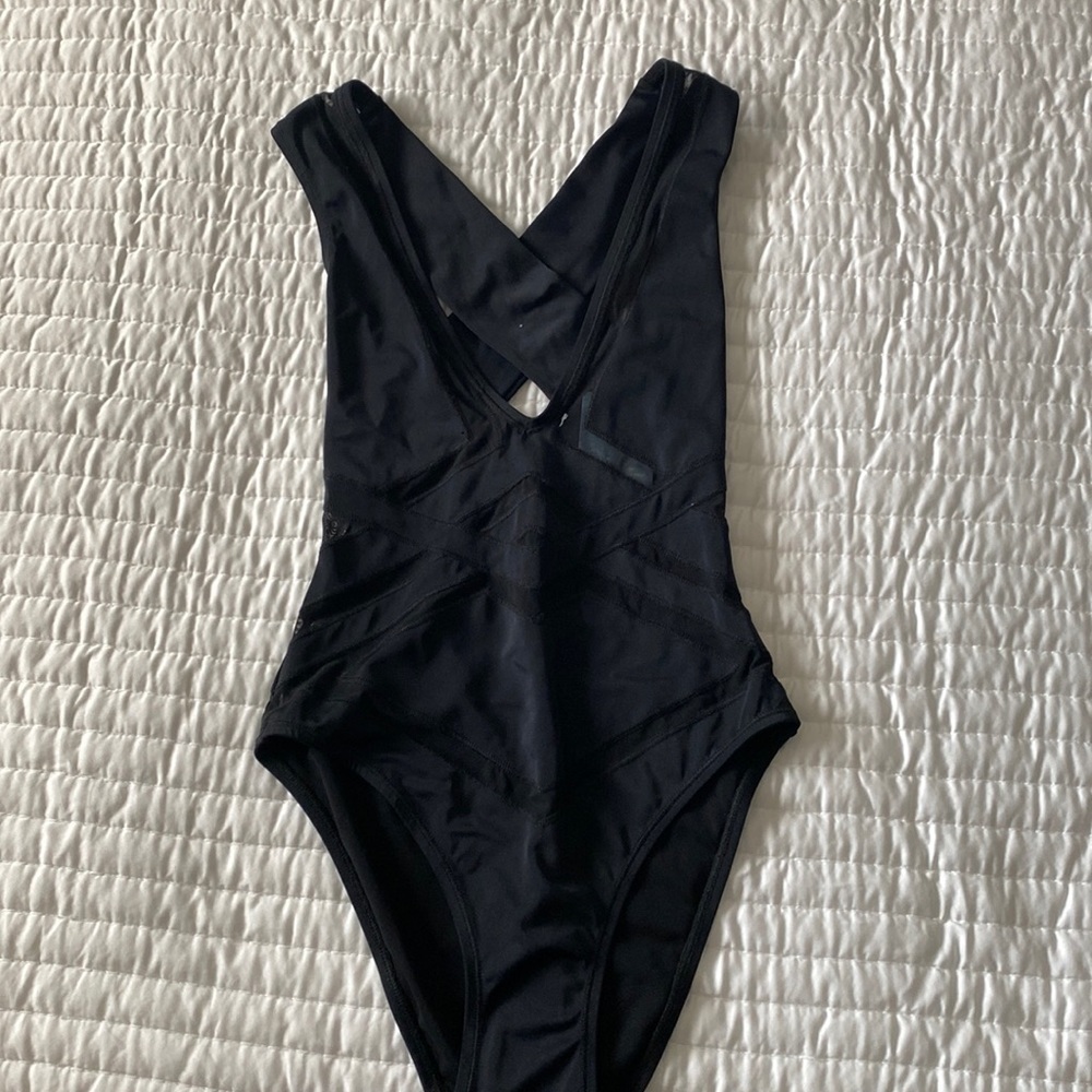 NWT Oye S Black swimsuit with sheer detail. Small.